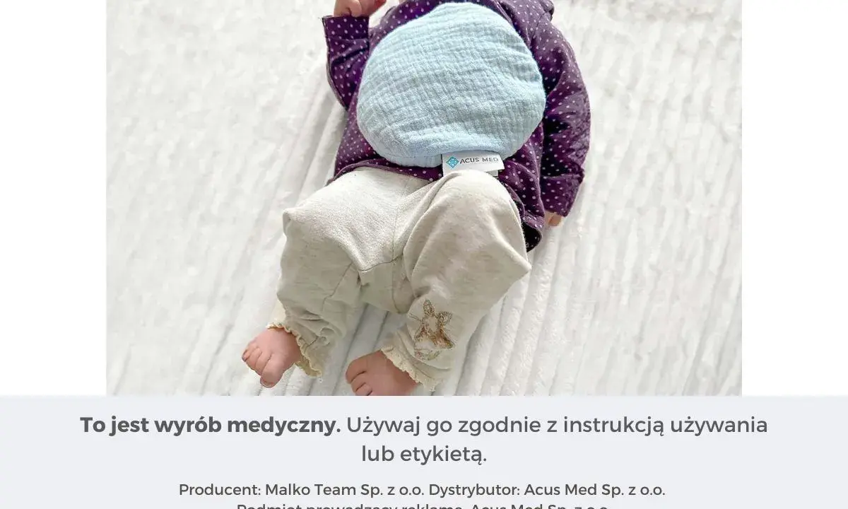 Ciepły termofor z pestek wiśni dla noworodka, delikatnie ogrzewający brzuszek maluszka.
