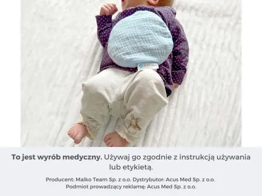 Ciepły termofor z pestek wiśni dla noworodka, delikatnie ogrzewający brzuszek maluszka.